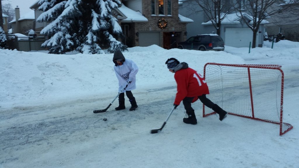 Street snow hockey in Canada.