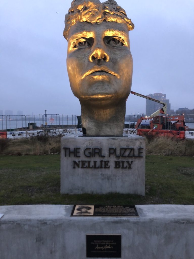 Bronze face Nellie Bly